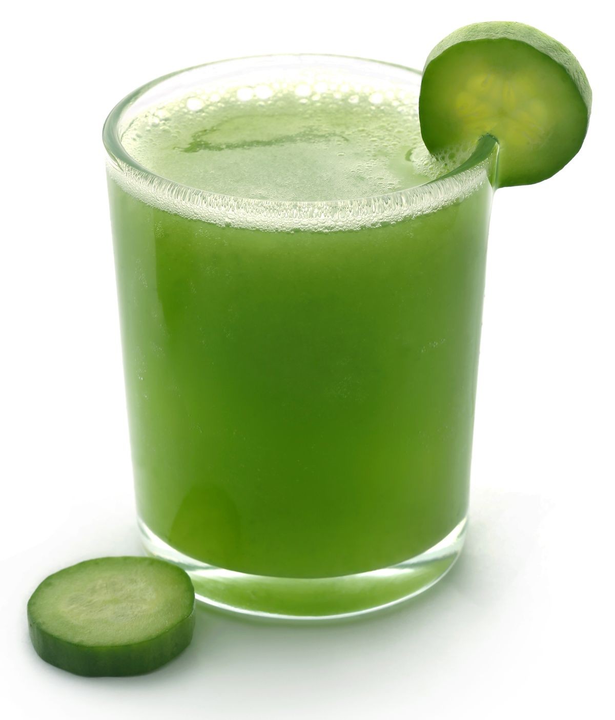 Fresh juice of green cucumber over white background